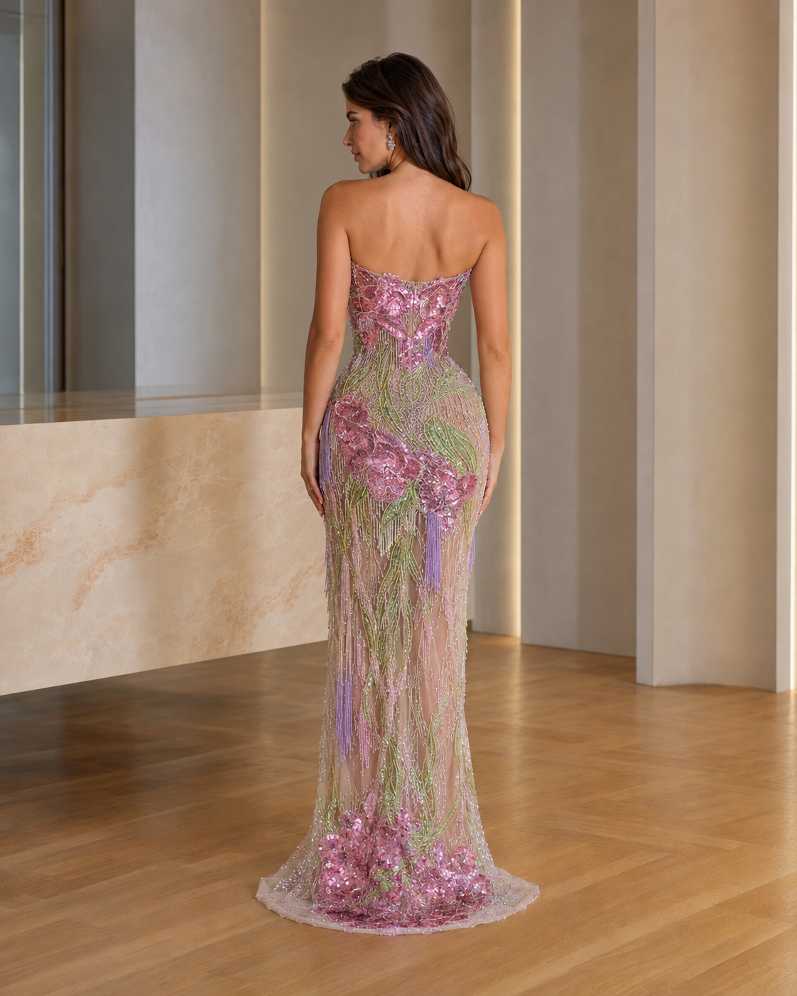 Pink strapless embroidered mermaid gown back view