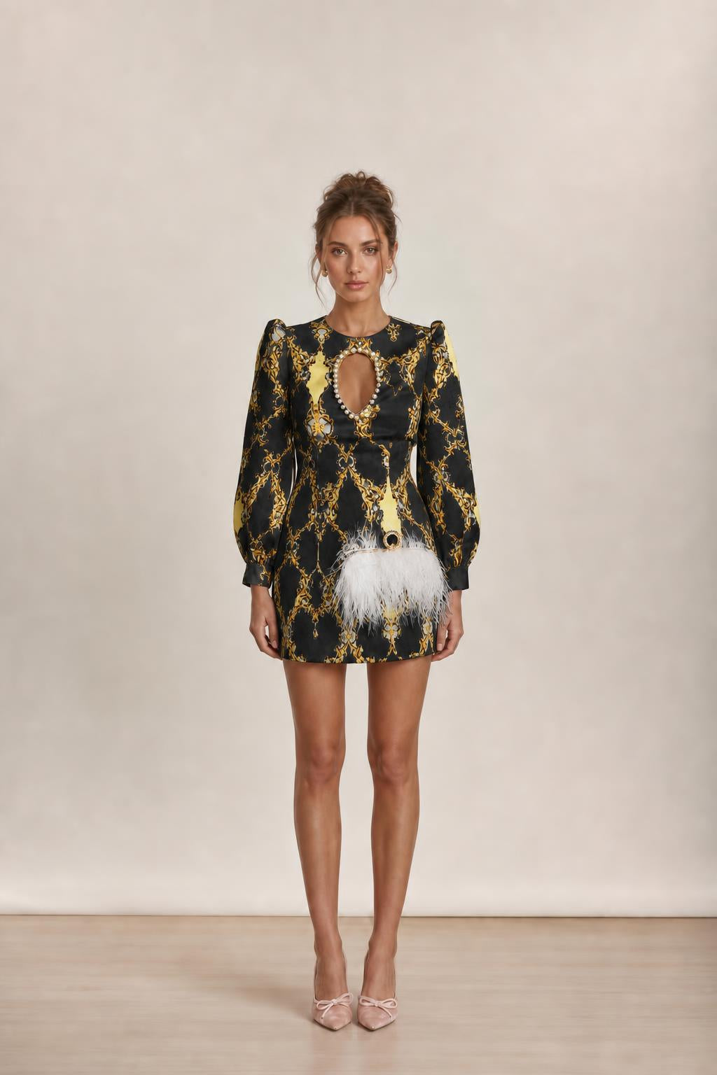 Model wearing black baroque print mini dress