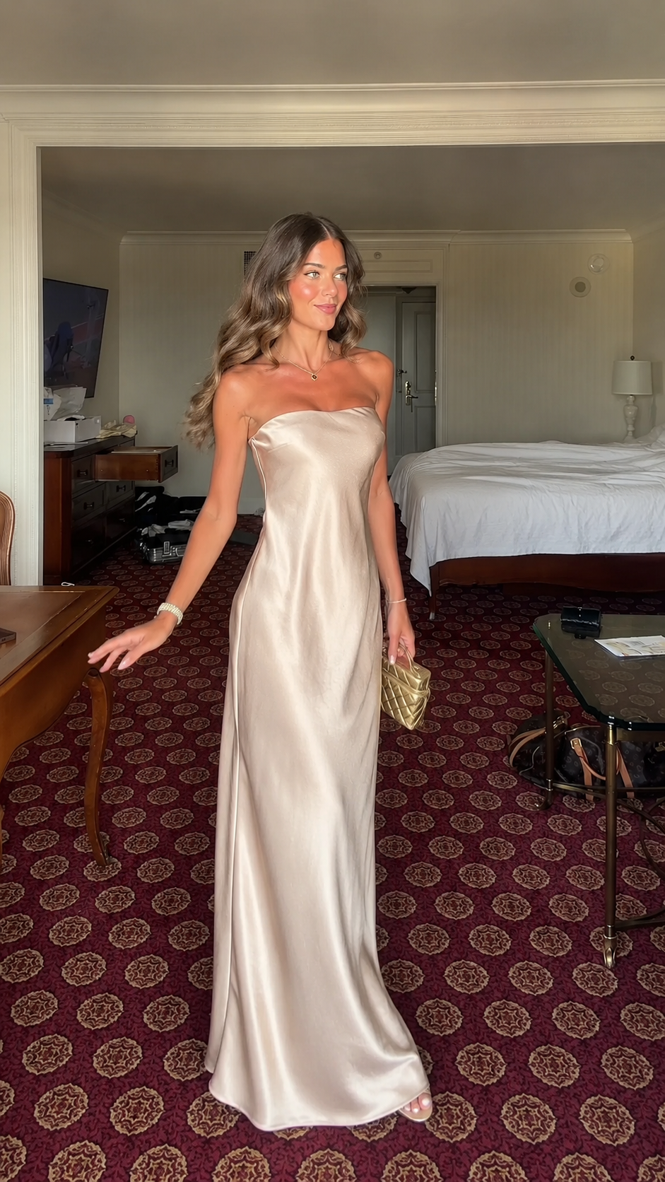 Front view of champagne strapless satin-look maxi dress