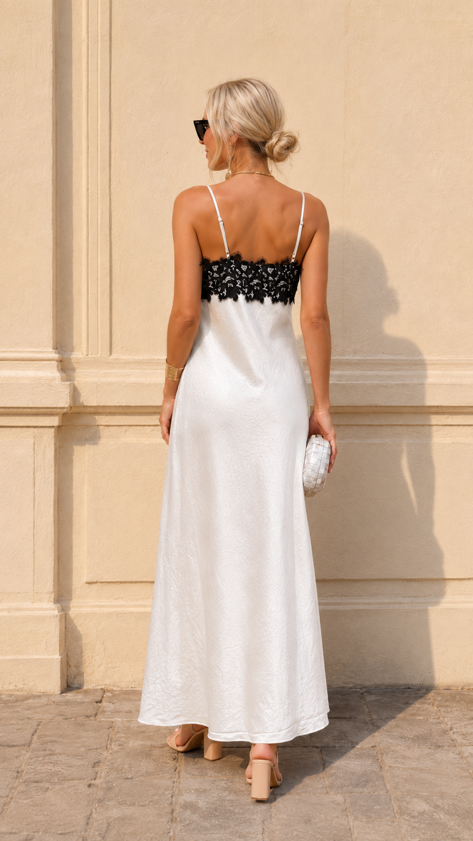 Back view of white satin-look lace trim maxi slip dress with spaghetti straps