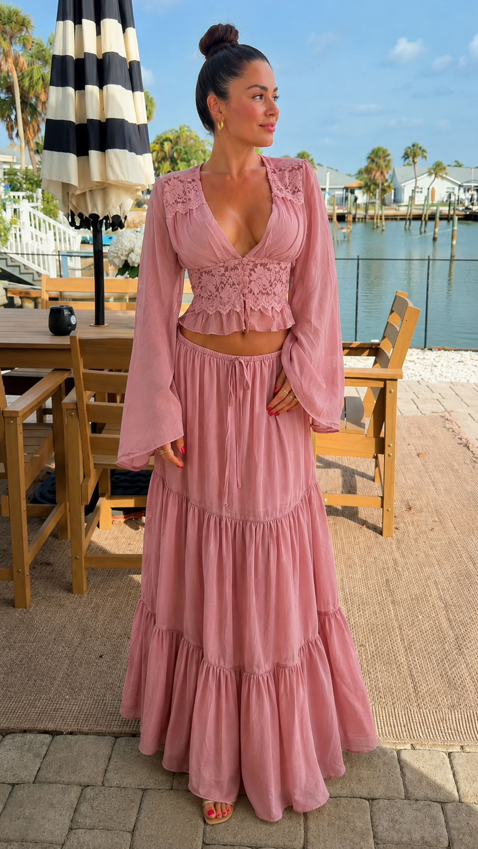 Front view of dusty rose lace crop top and tiered maxi skirt set