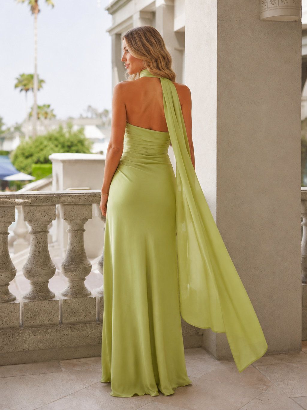 Lime green strapless maxi evening dress back view with flowing scarf panel