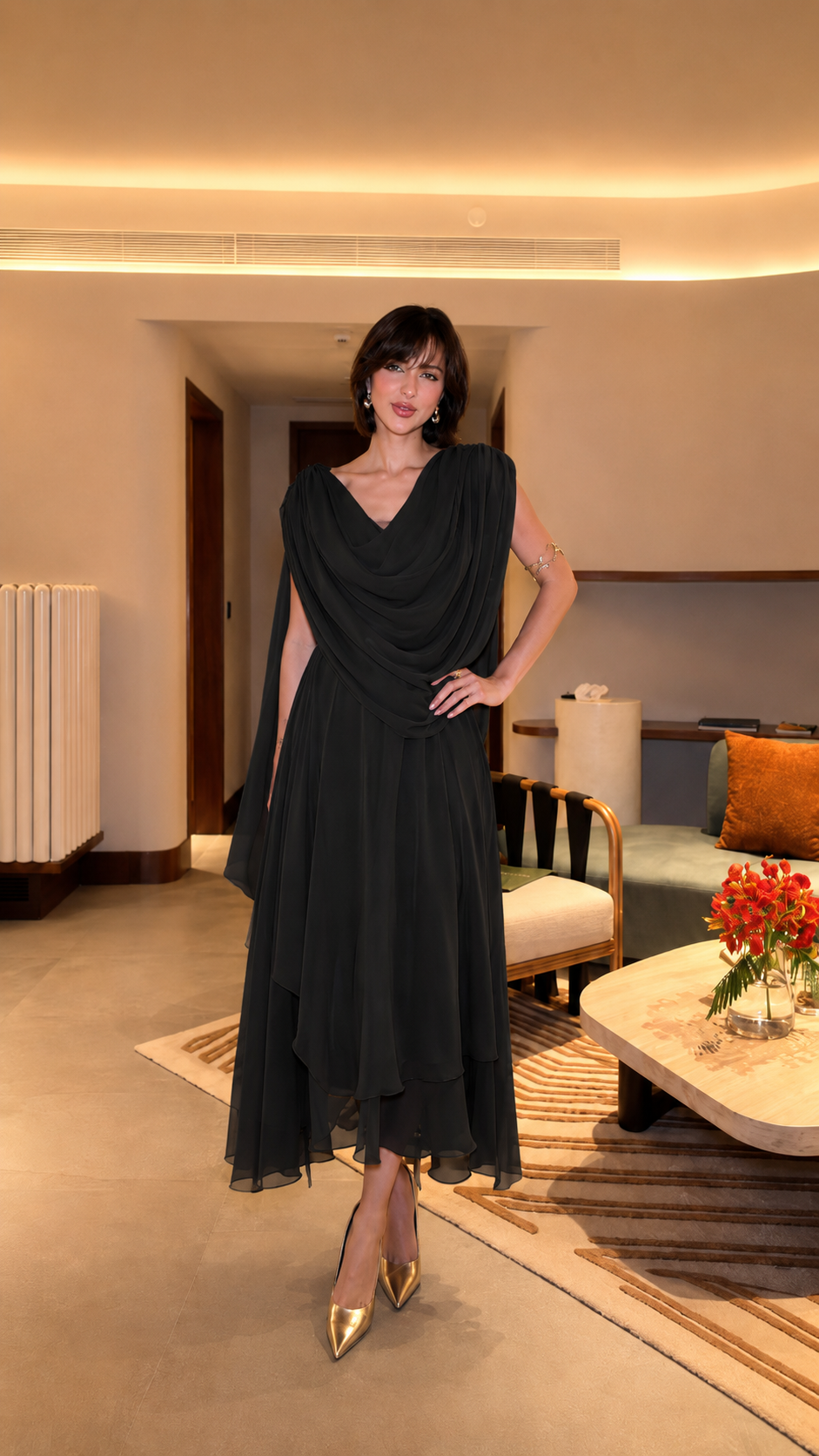 Front view of black draped midi evening dress with layered chiffon-look skirt