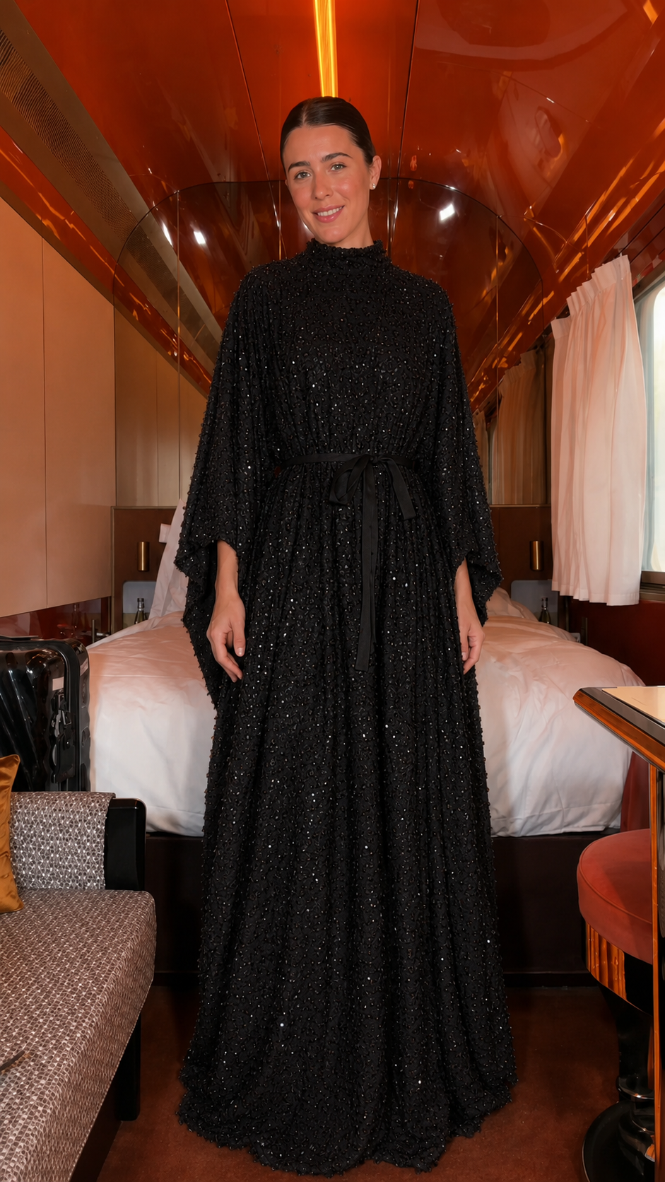 Front view of black textured sequin belted maxi caftan dress