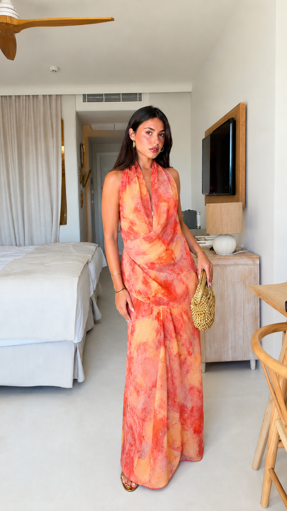 Coral tie-dye halter maxi dress front view with draped front detail