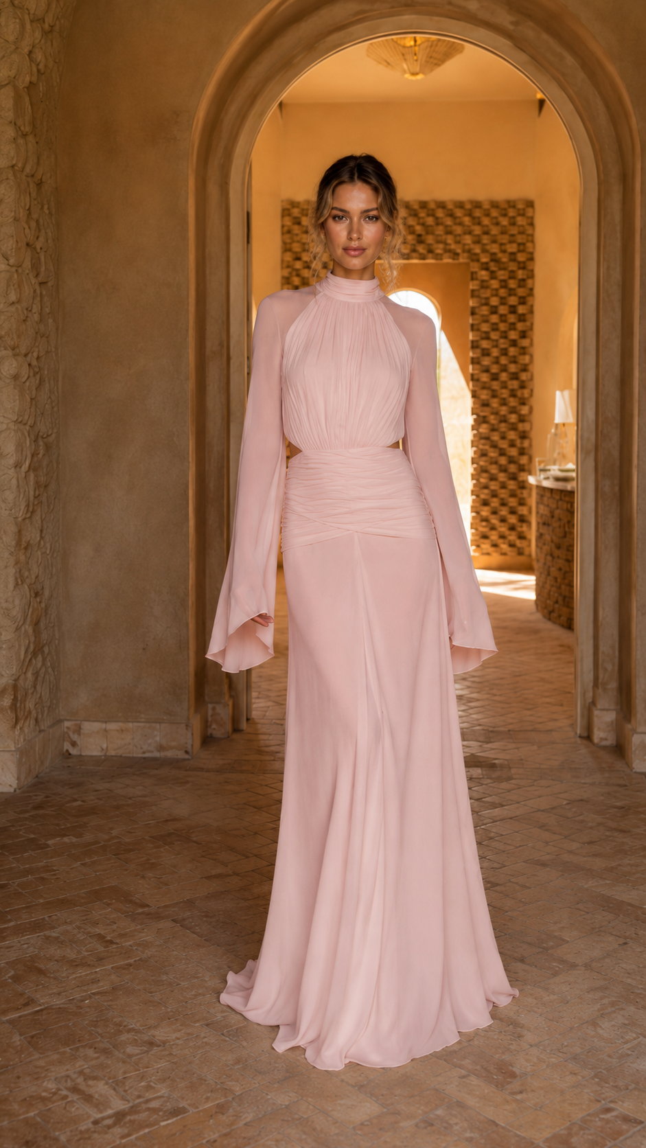Front view of blush pink gathered maxi formal dress with side cutouts