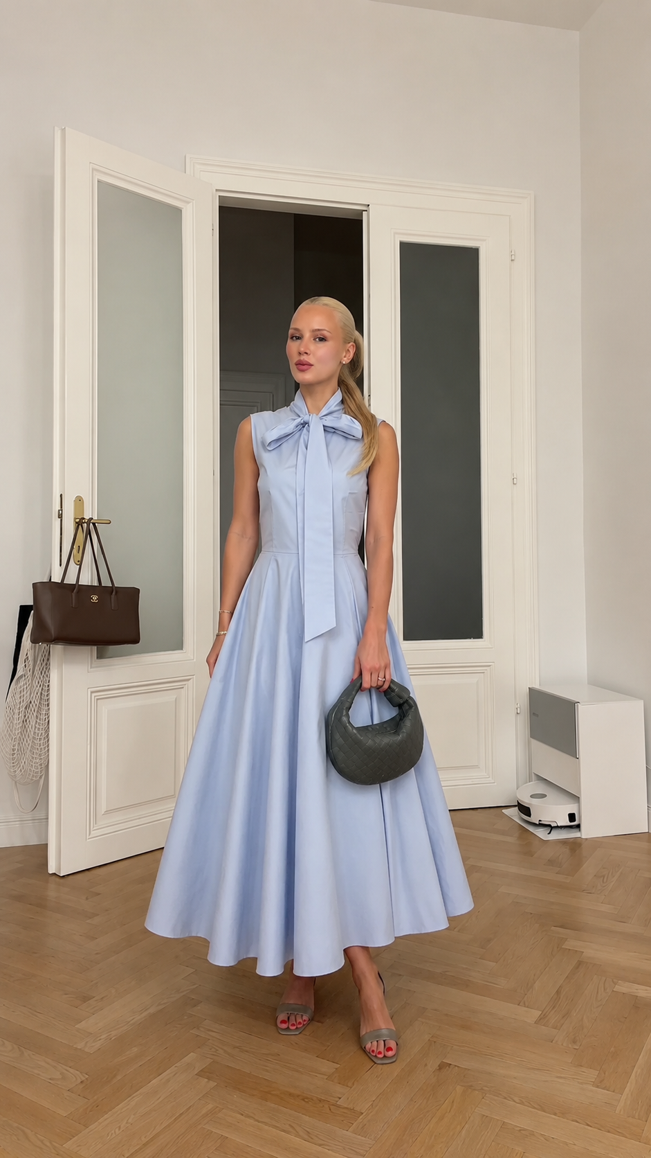 Front view of powder blue sleeveless bow neck midi dress