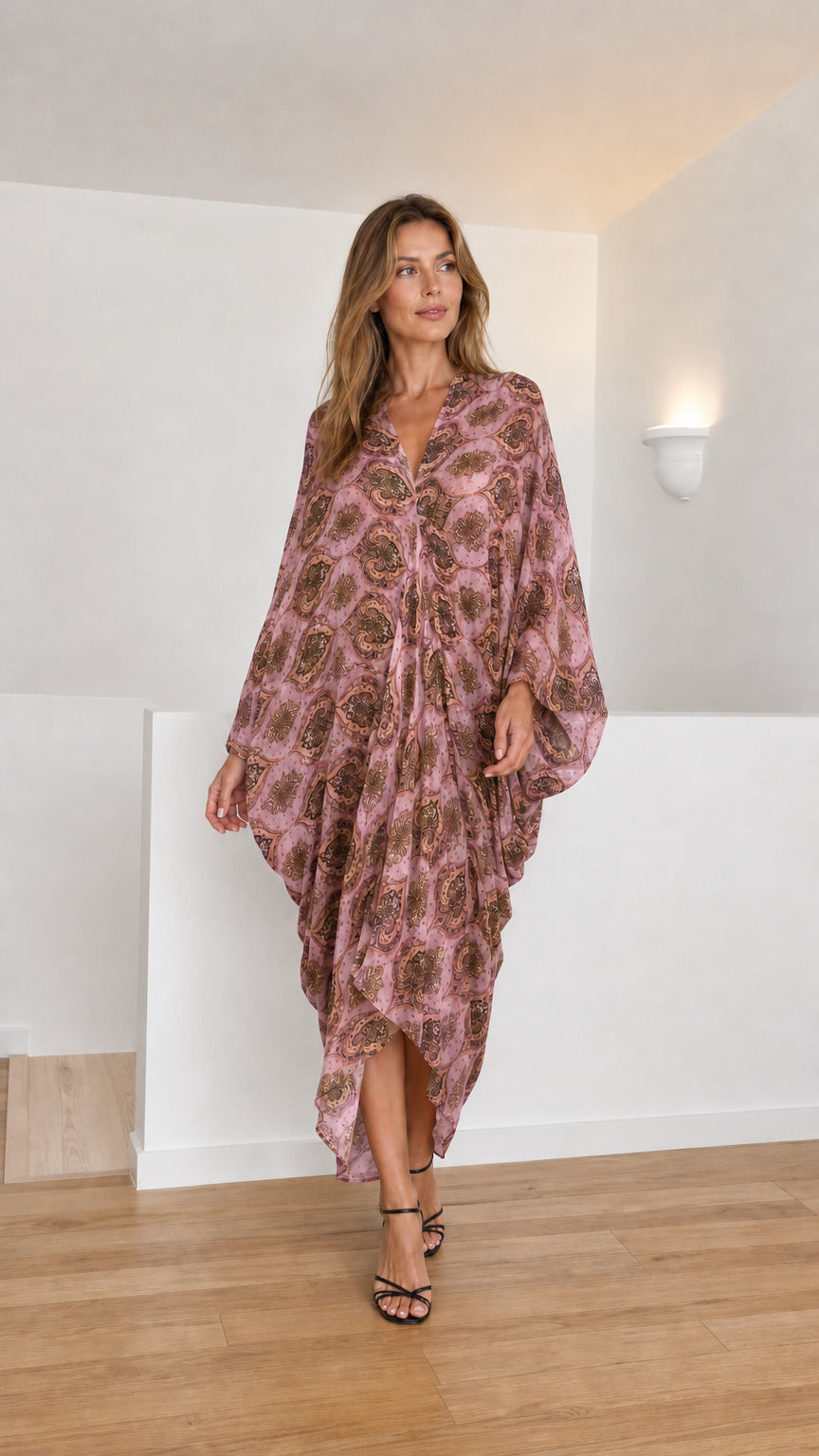 Model wearing pink paisley kaftan dress