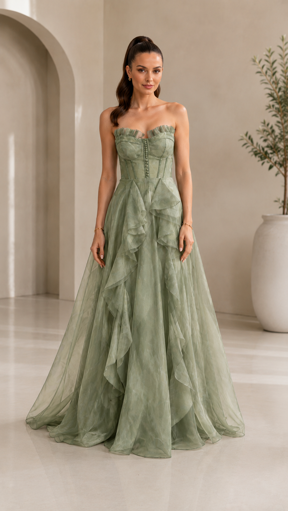 Front view of sage green strapless evening dress with ruffle panels and full-length skirt