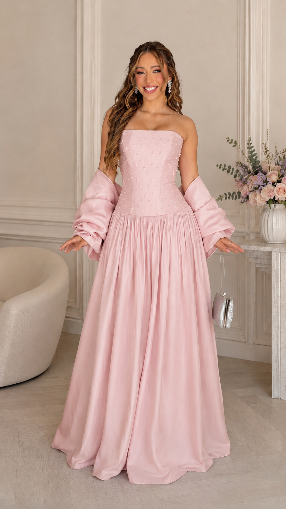 Front view of blush pink strapless beaded bodice maxi gown with matching shawl