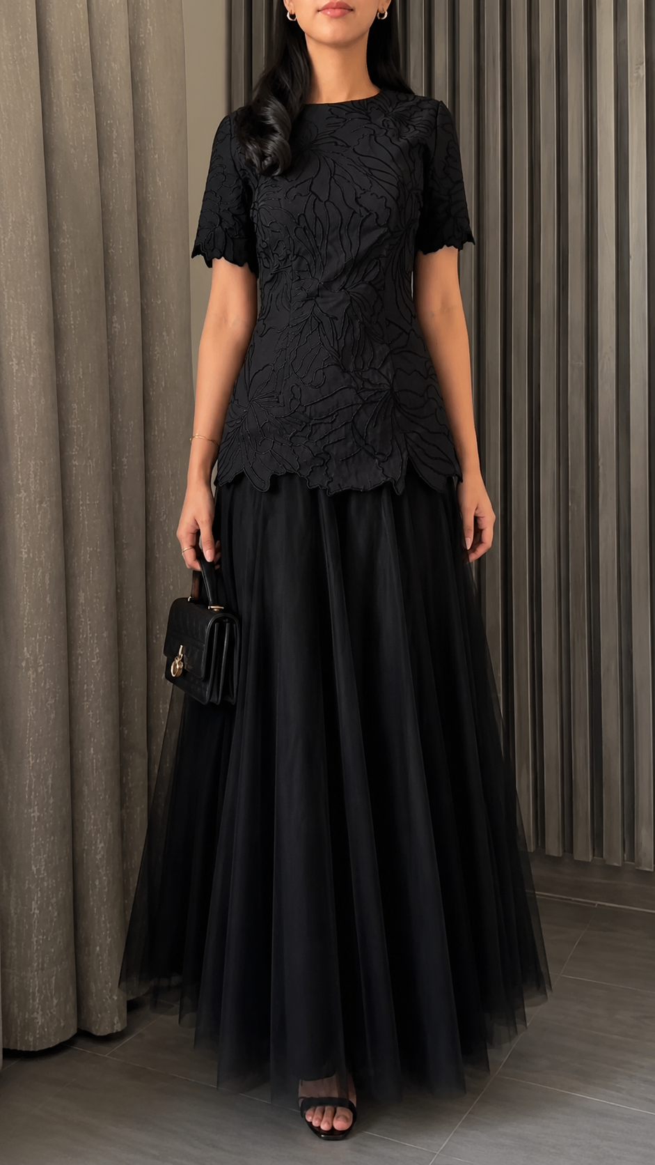 Front view of black short sleeve floral textured maxi evening dress
