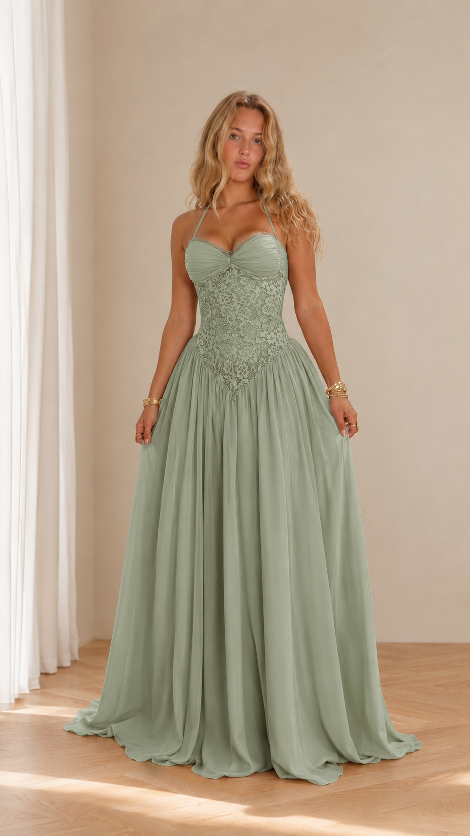 Front view of sage green lace corset floor-length gown