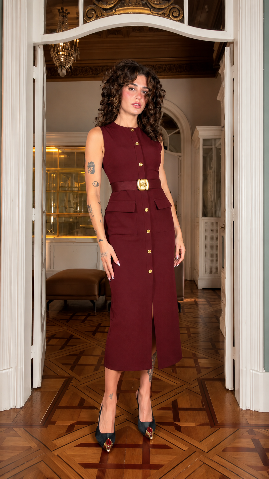 Front view of burgundy sleeveless belted button-front midi dress