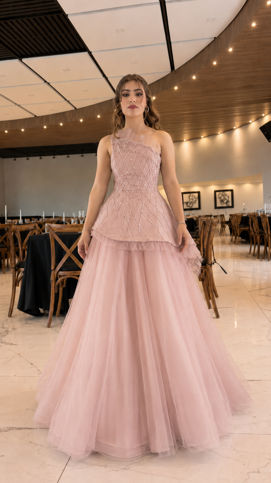 Front view of blush pink one-shoulder embellished maxi gown