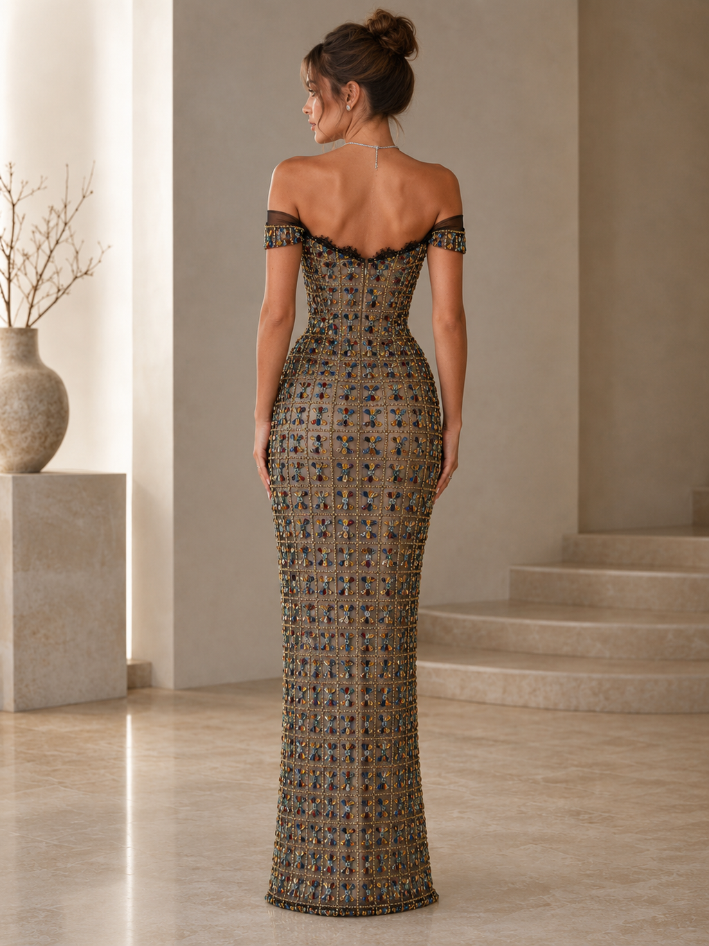 Back view of taupe off-shoulder embellished mermaid maxi dress