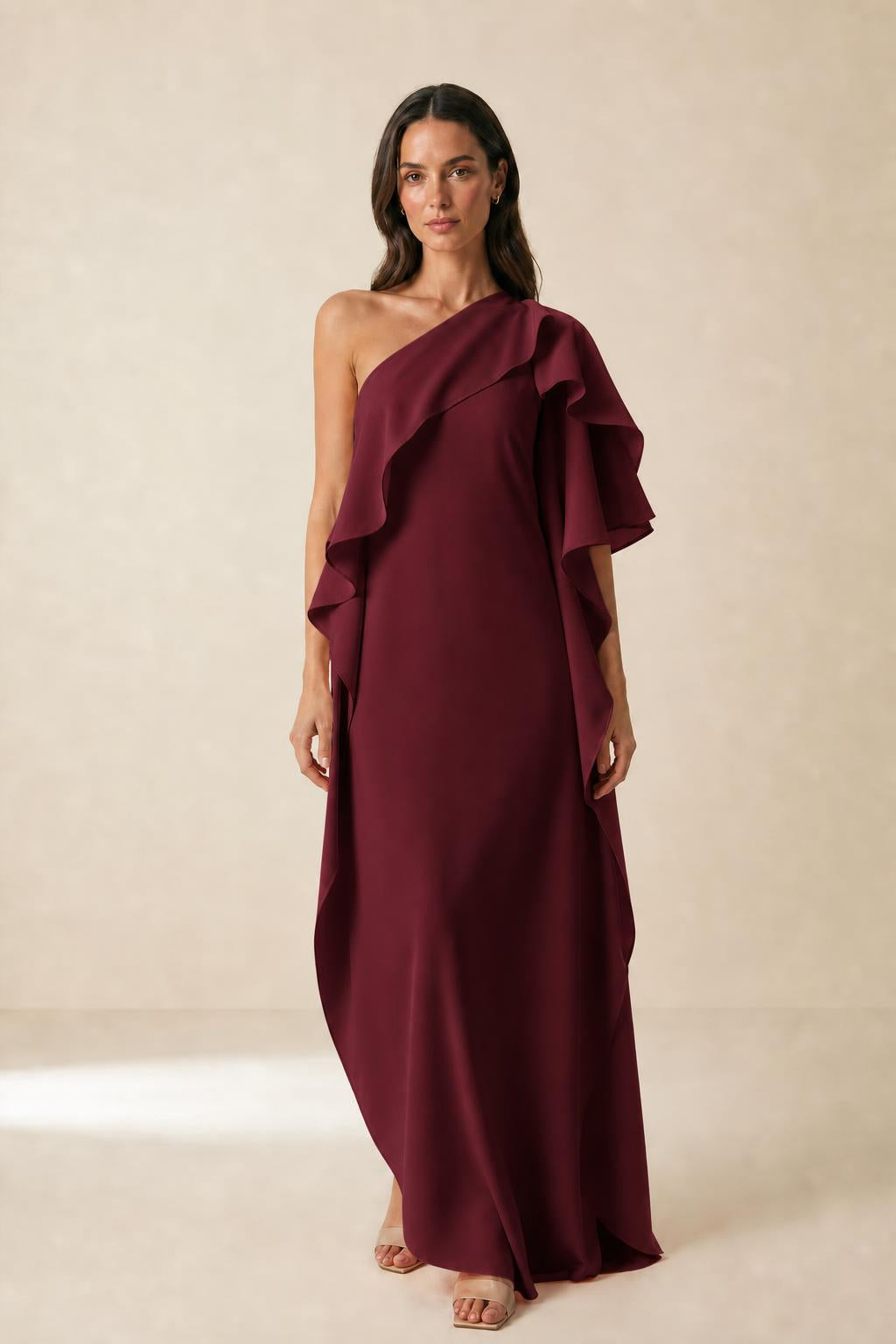Front view of model wearing burgundy one-shoulder ruffle maxi dress