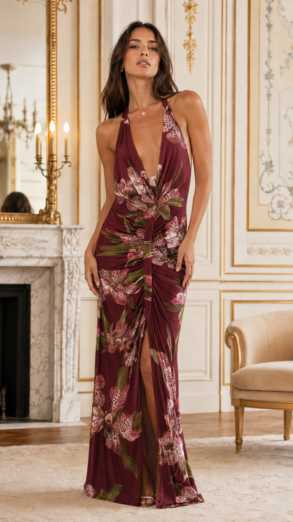 Front view of burgundy floral halter maxi dress with open-back silhouette