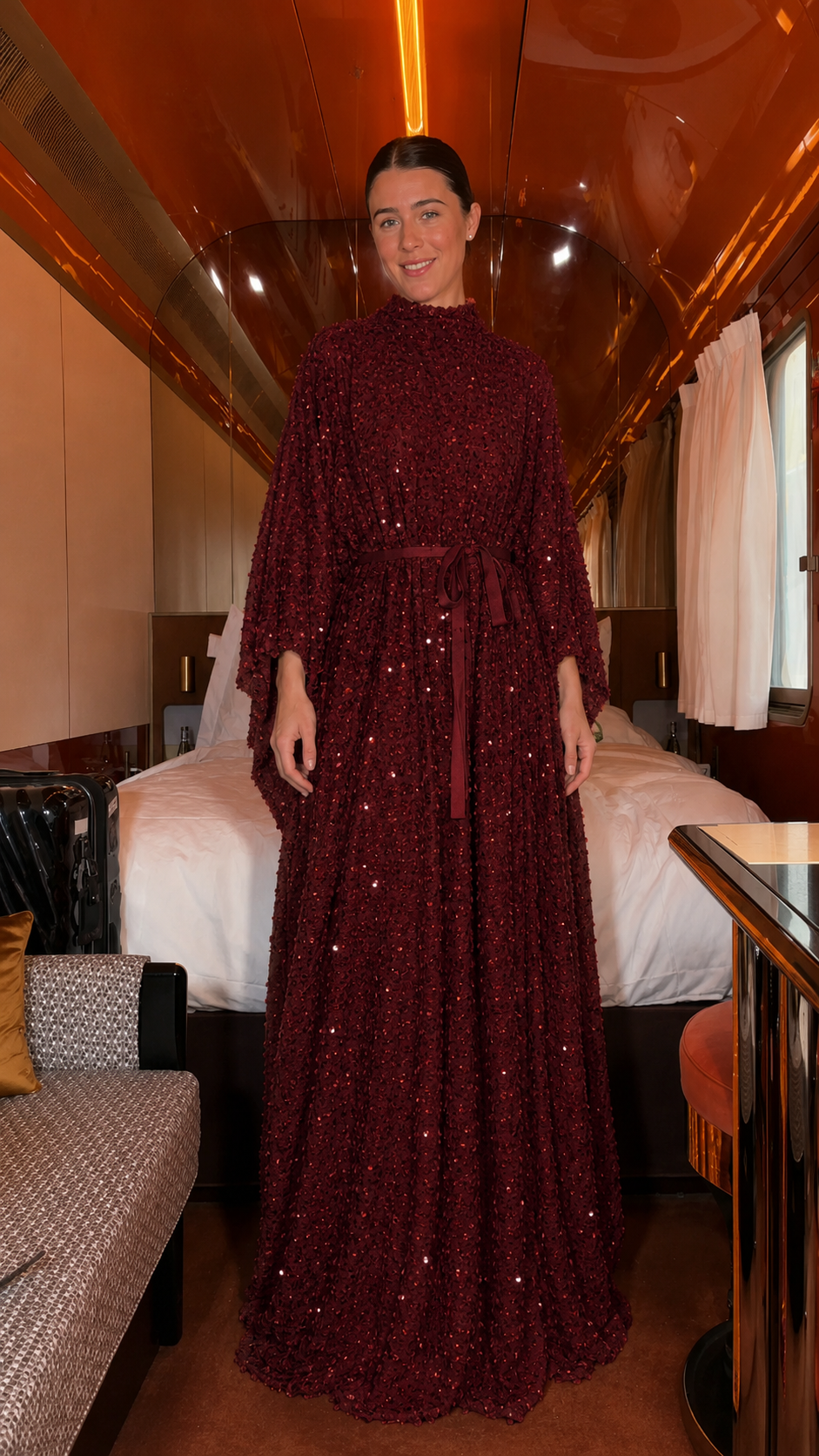 Front view of burgundy shimmering textured high-neck maxi caftan dress