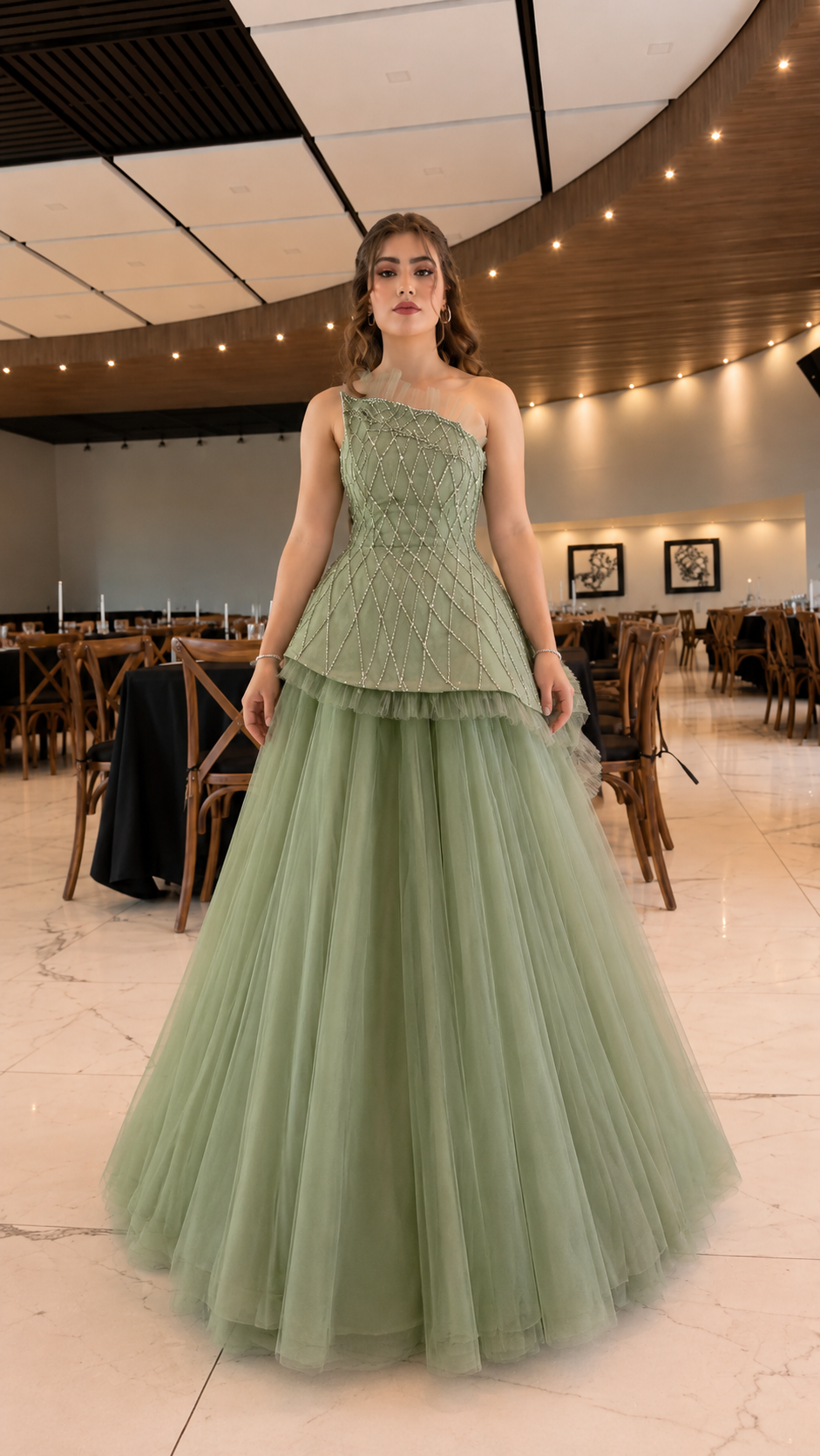 Front view of sage green beaded bodice tulle evening dress