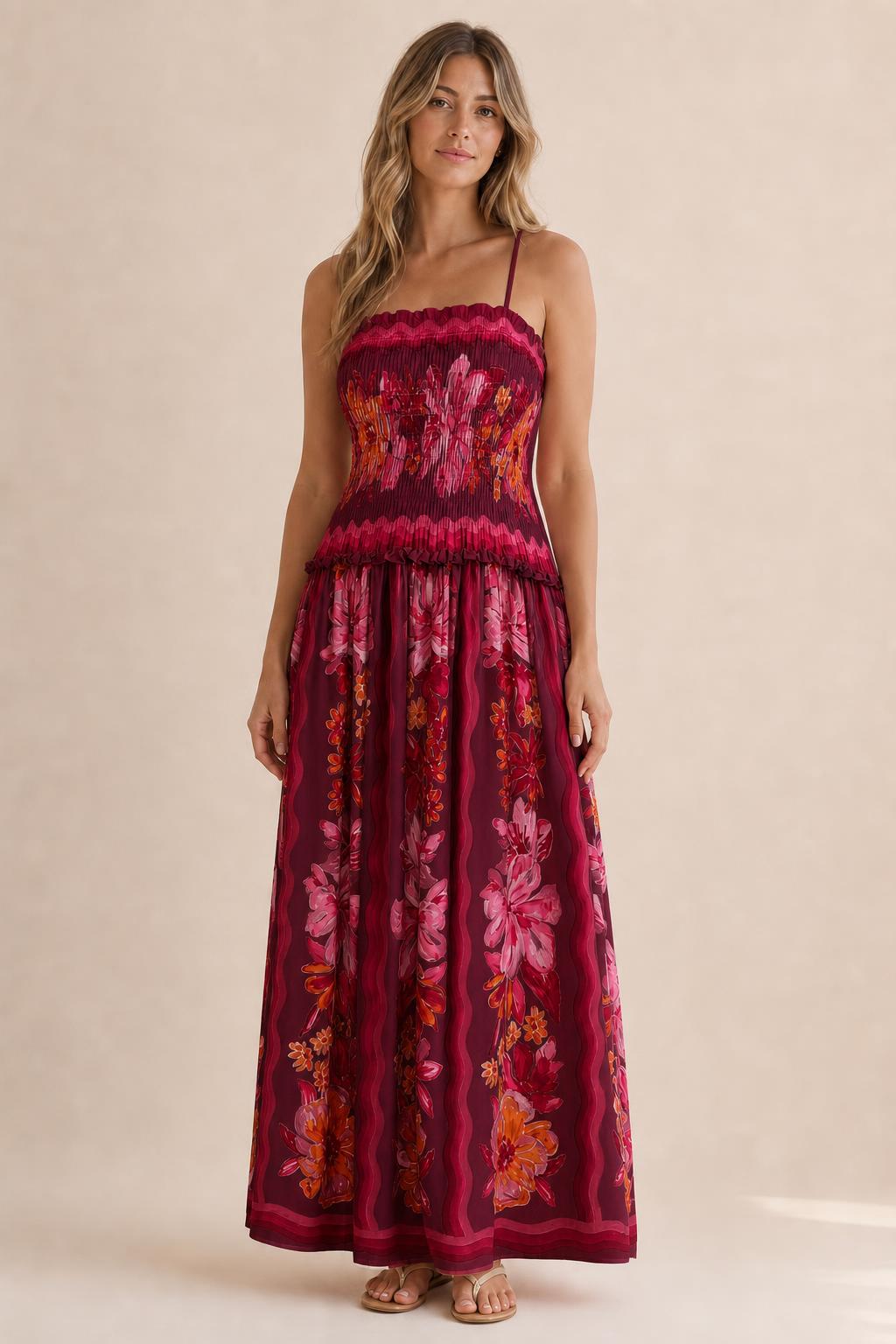 Front view of floral print smocked maxi dress in burgundy