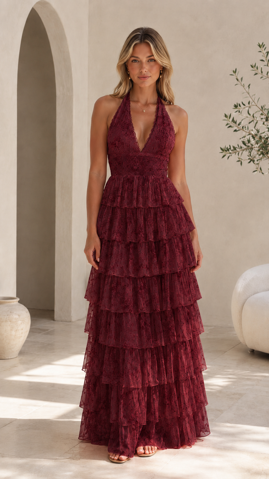 Front view of burgundy tiered halter maxi dress