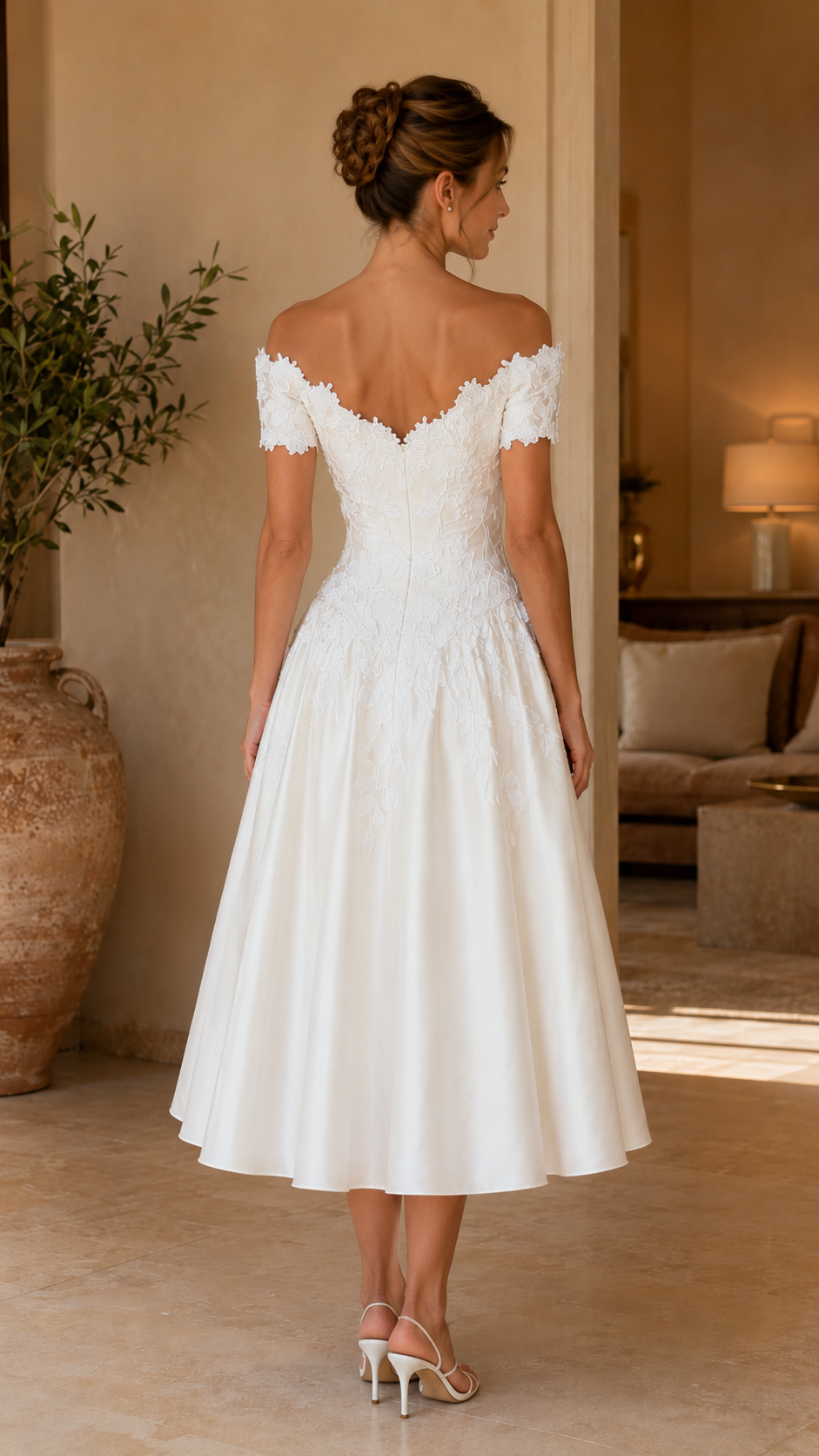 Back view of white off-shoulder lace midi A-line dress