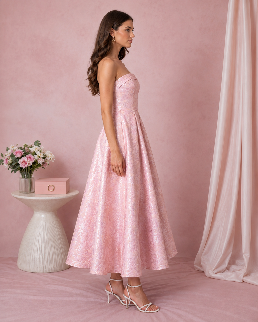 Side view of blush pink strapless jacquard A-line midi dress