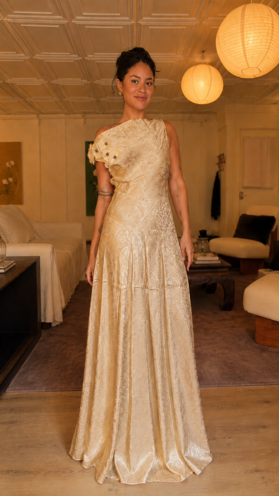 Front view of champagne one-shoulder textured formal gown
