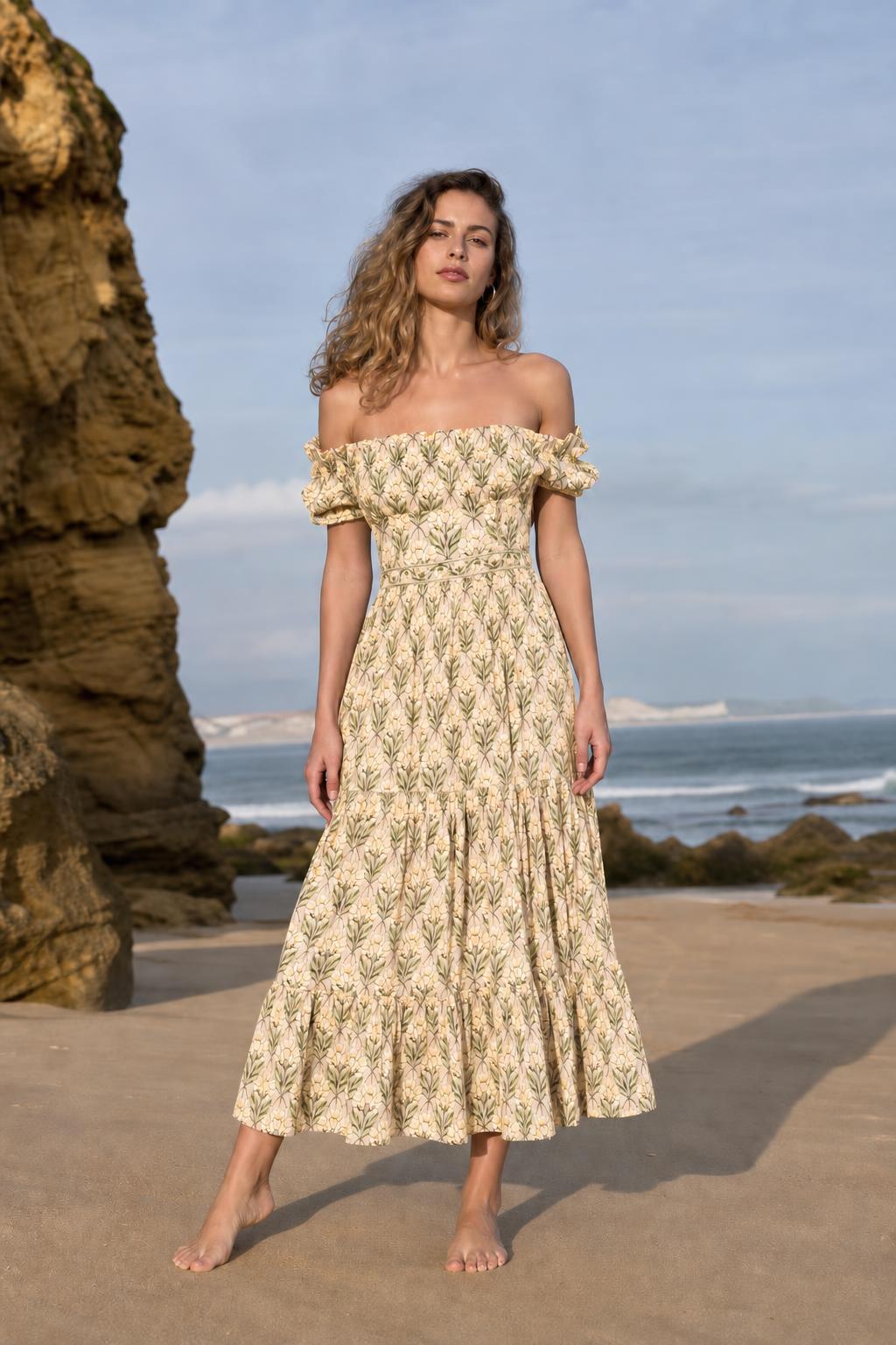 Woman wearing yellow floral off-the-shoulder midi dress